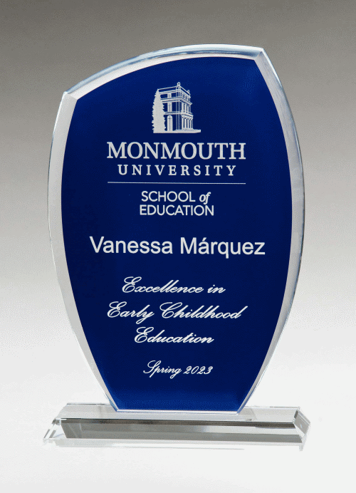 A Tidal Series Glass Award with Painted Background, by Airflyte, with the Monmouth University logo on it.