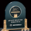 Airflyte Series  with CAM medallion on a gold-plated brass base with columns.