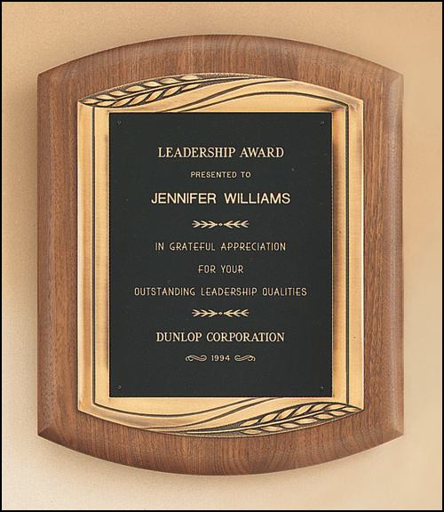 A Airflyte P1901 11-1/2 " x 14" American Walnut plaque with the words leadership award on it.