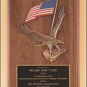 Solid American walnut Airflyte plaque with a large eagle and American flag casting.